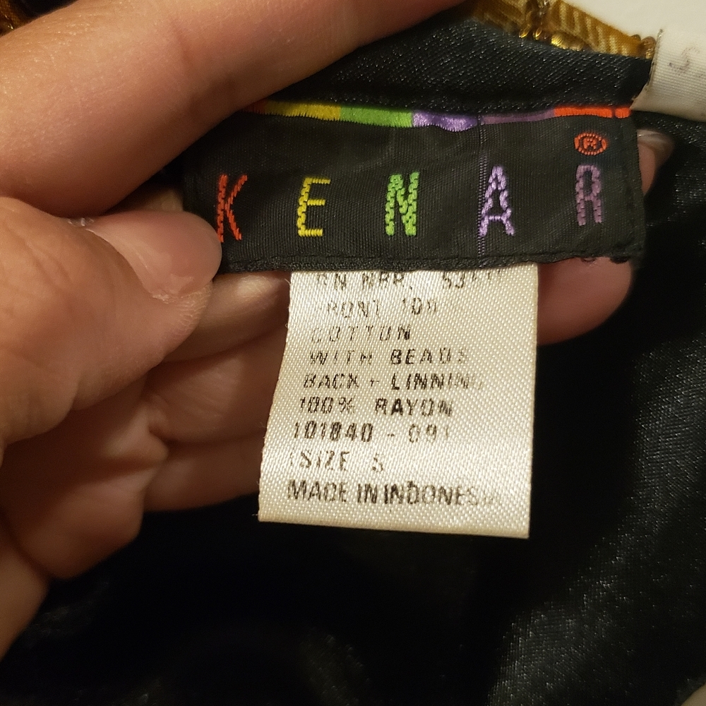 Black gold vest